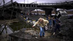 Britain says Russian column inches towards Kyiv, Ukrainian refugees top 1 million