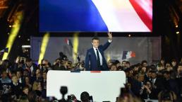 Macron vows to govern for all after election victory