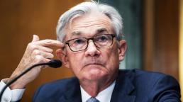 Fed raises key rate by a half-point in bid to tame inflation