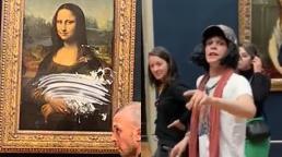 Mona Lisa: Man dressed as old woman throws cake at da Vinci painting