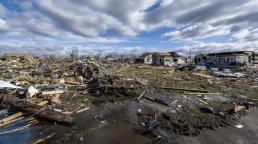 At least 26 dead after tornadoes rake US Midwest, South