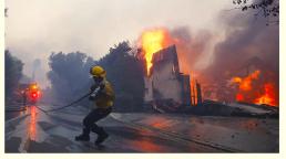 California Wildfires Force Thousands to Flee as Homes Burn Across Los Angeles