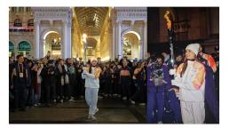 La antorcha olímpica llega a la Plaza del Duomo en manos de Nicoletta Manni, primera bailarina del Teatro alla Scala y última portadora de la llama. Foto: Andrea P. @photopk_shots