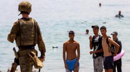 España cancela permisos militares ante el temor a otra entrada masiva en Ceuta el 15 de agosto.