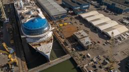 Royal Caribbean's Hero of the Seas floats out for the first time ahead of 2027 Miami debut.