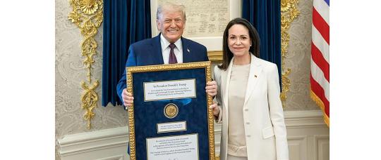 Trump accepts Nobel medal from Venezuelan opposition leader Machado.